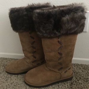 Tall fur Ugg boots